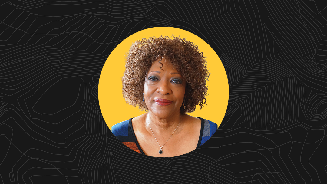 Portrait of Rita Dove with black topographic pattern of "A" mountain in the background.