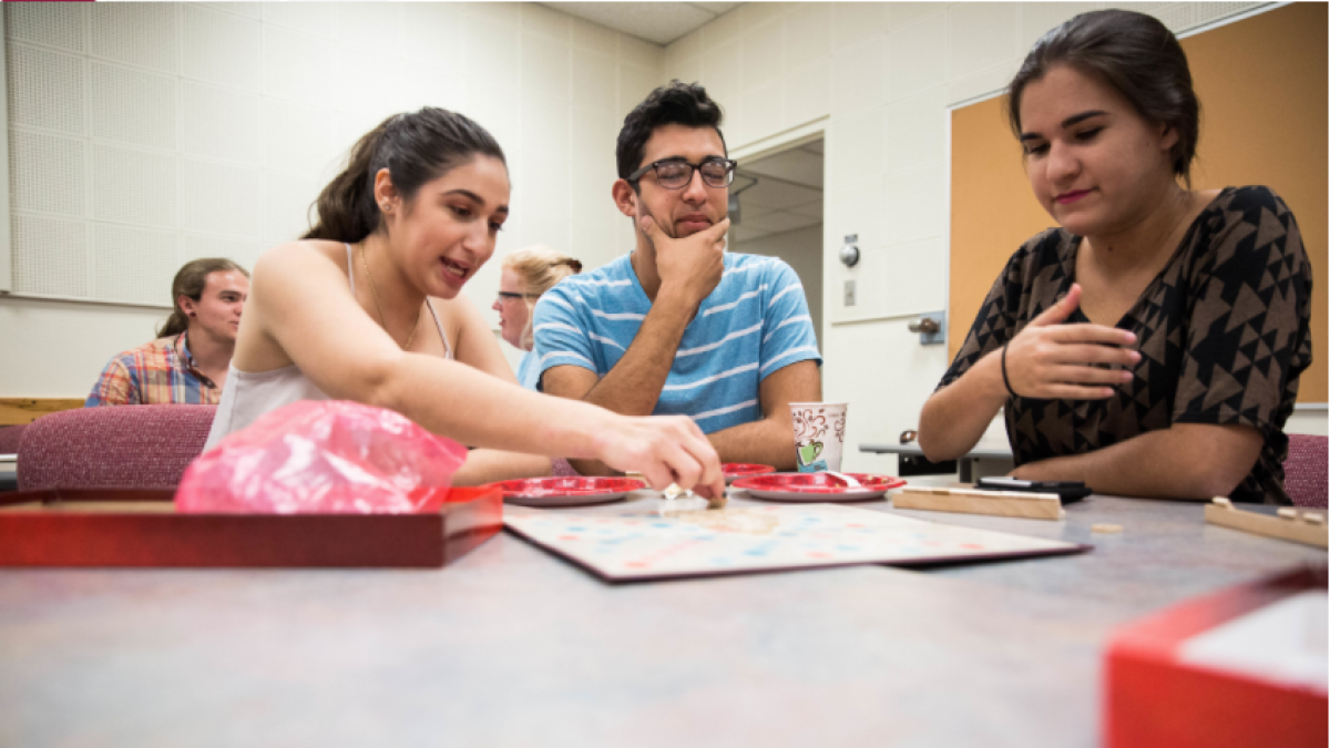 3 students playing scramble.